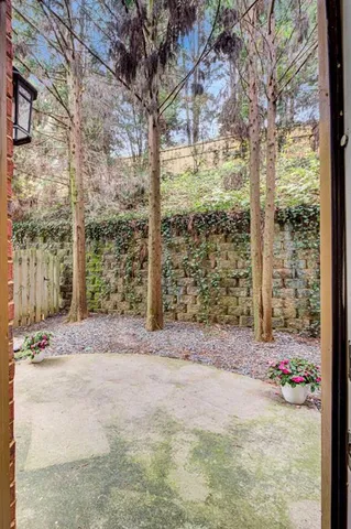 a view of a backyard of a house