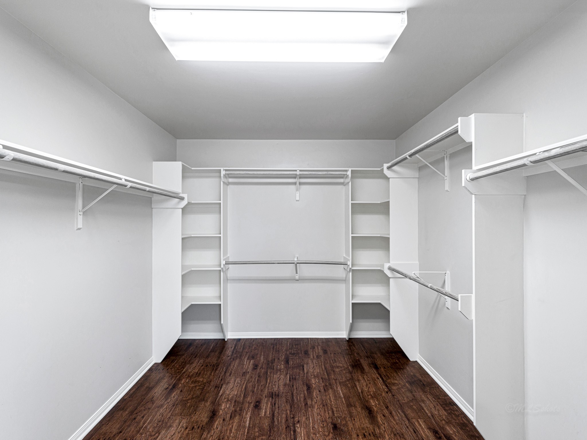 32601 Rogers Road Fulshear, TX 77441 - Photo 30 of 50 This grand closet is every homeowner's dream! The open lay out gives you easy access to select your wardrobe for the day.