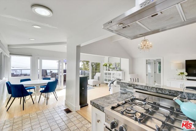 a living room with lots of furniture and a flat screen tv