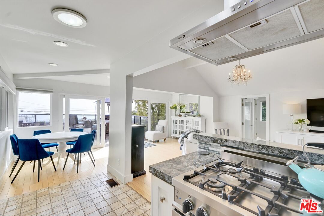3966 Las Flores Canyon Road Malibu, CA 90265 - Photo 22 of 53 a living room with furniture and a table