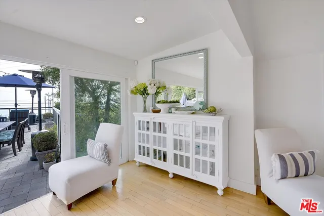 a large living room with furniture and a flat screen tv