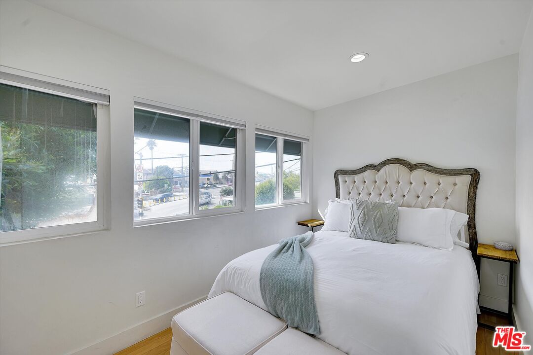3966 Las Flores Canyon Road Malibu, CA 90265 - Photo 39 of 53 a bedroom with a bed and window