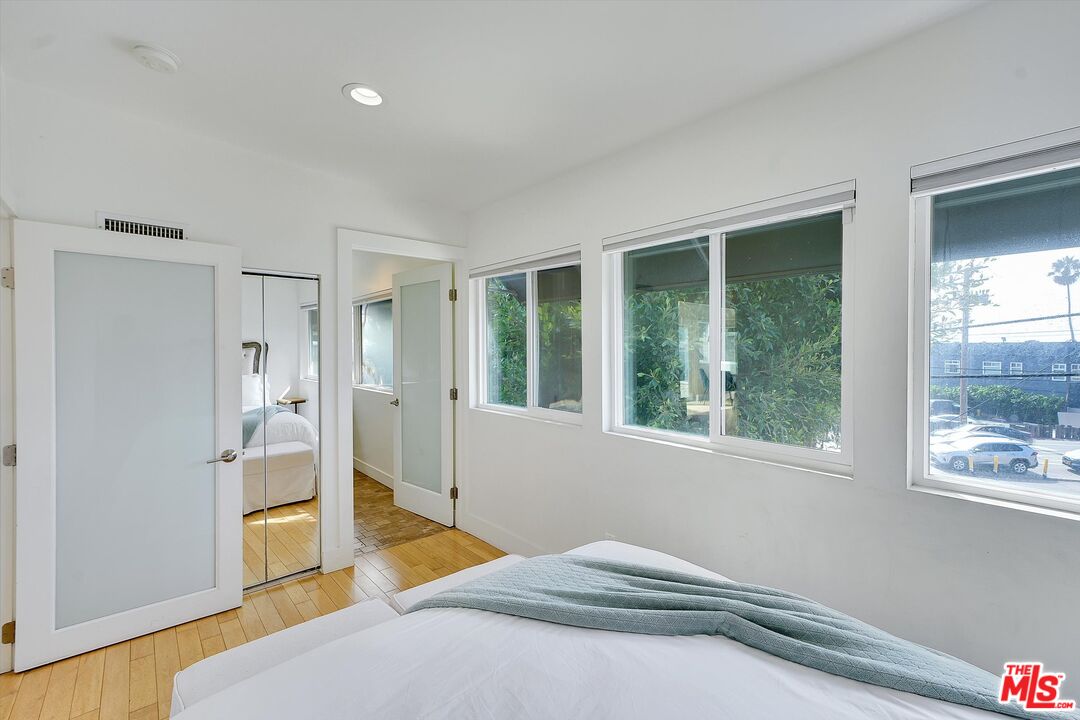 3966 Las Flores Canyon Road Malibu, CA 90265 - Photo 41 of 53 a bedroom with a bed and a window
