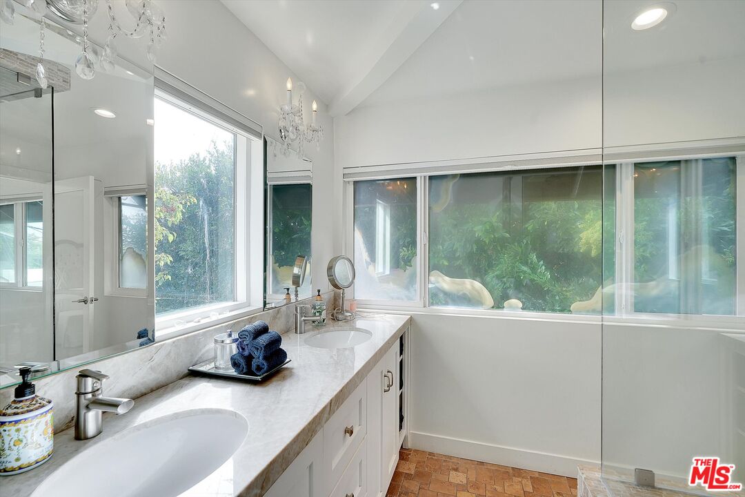 3966 Las Flores Canyon Road Malibu, CA 90265 - Photo 45 of 53 a room with a large window and a sink