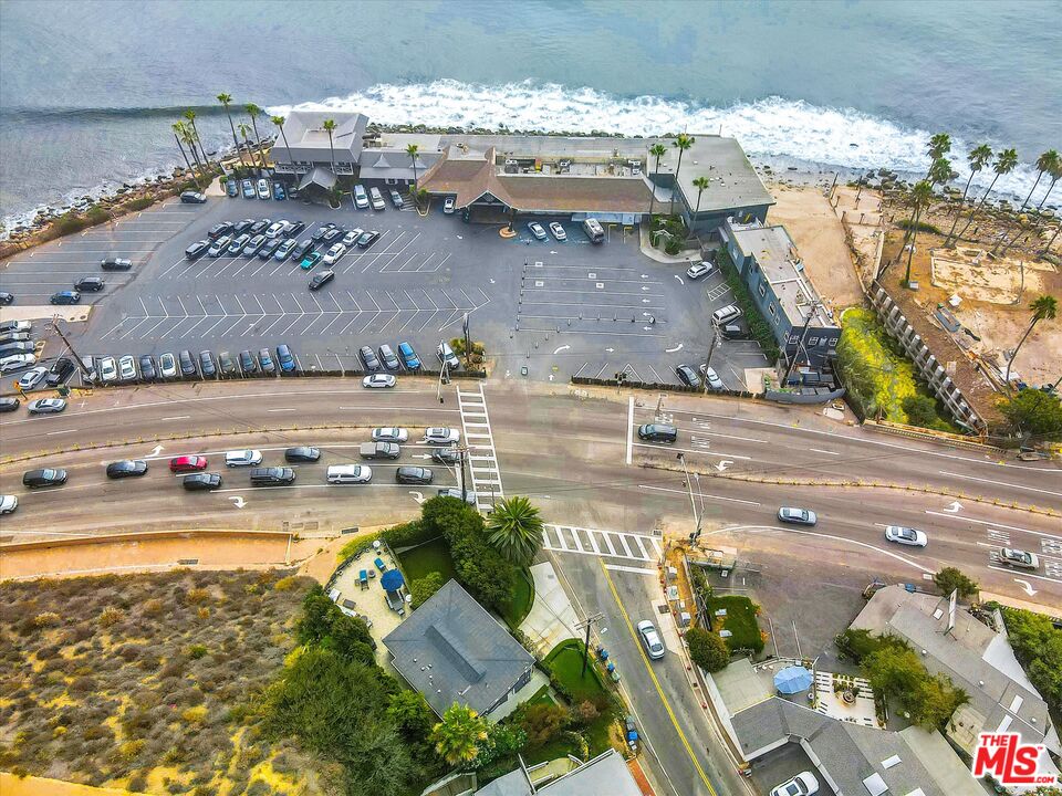 3966 Las Flores Canyon Road Malibu, CA 90265 - Photo 50 of 53 an aerial view of a house with a swimming pool