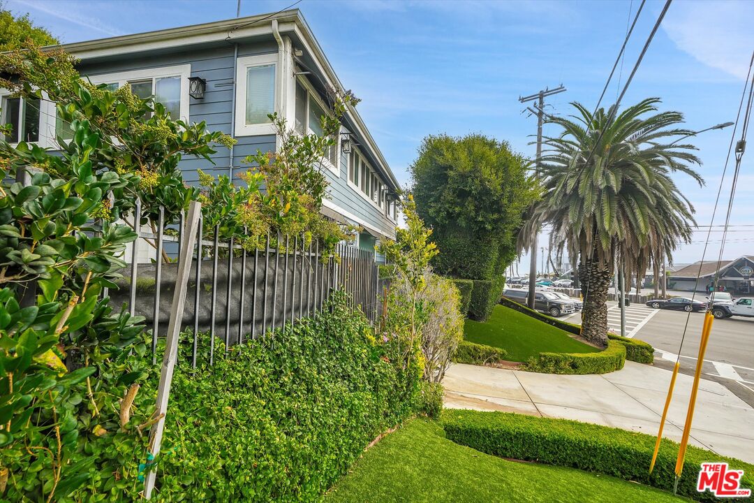 3966 Las Flores Canyon Road Malibu, CA 90265 - Photo 8 of 53 a front view of a house with a yard