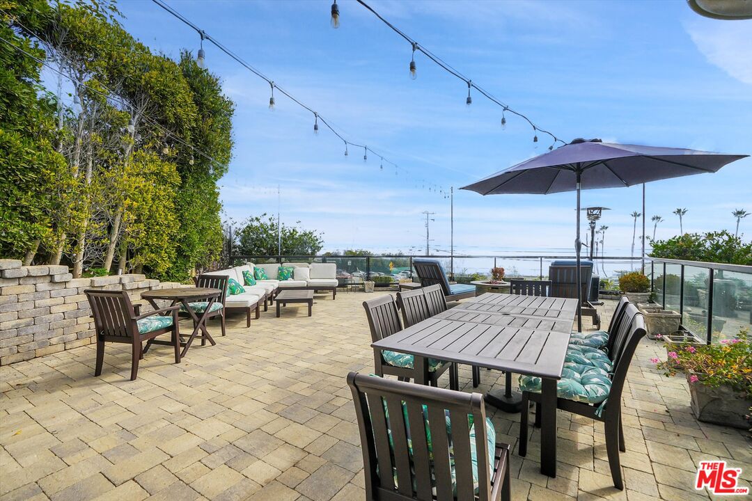 3966 Las Flores Canyon Road Malibu, CA 90265 - Photo 10 of 53 an outdoor space with furniture and umbrella