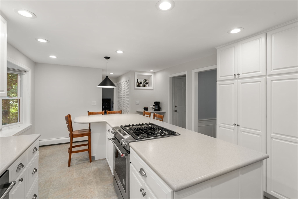 1 Pueblo Road Medfield, MA 02052 - Photo 11 of 36 a kitchen with a stove and a refrigerator