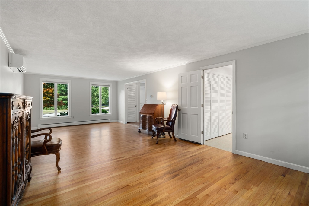 1 Pueblo Road Medfield, MA 02052 - Photo 12 of 36 a view of a workspace with furniture and a window