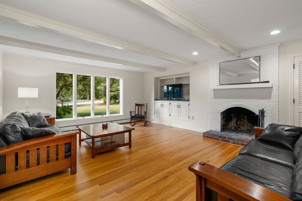 1 Pueblo Road Medfield, MA 02052 - Photo 14 of 36 a living room with furniture and a fireplace