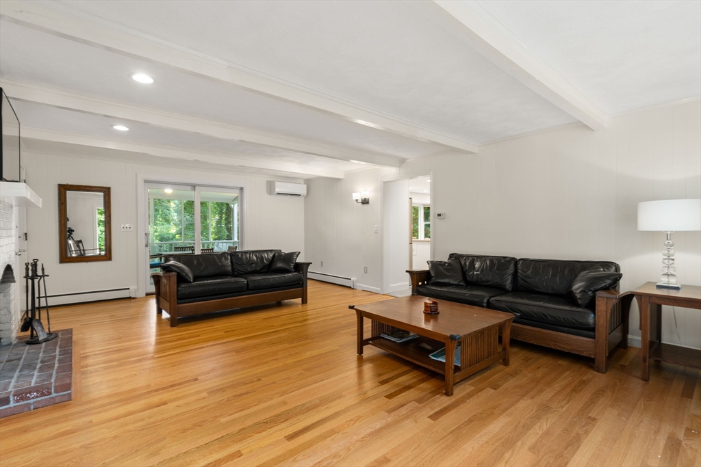 1 Pueblo Road Medfield, MA 02052 - Photo 17 of 36 a living room with furniture and a wooden floor