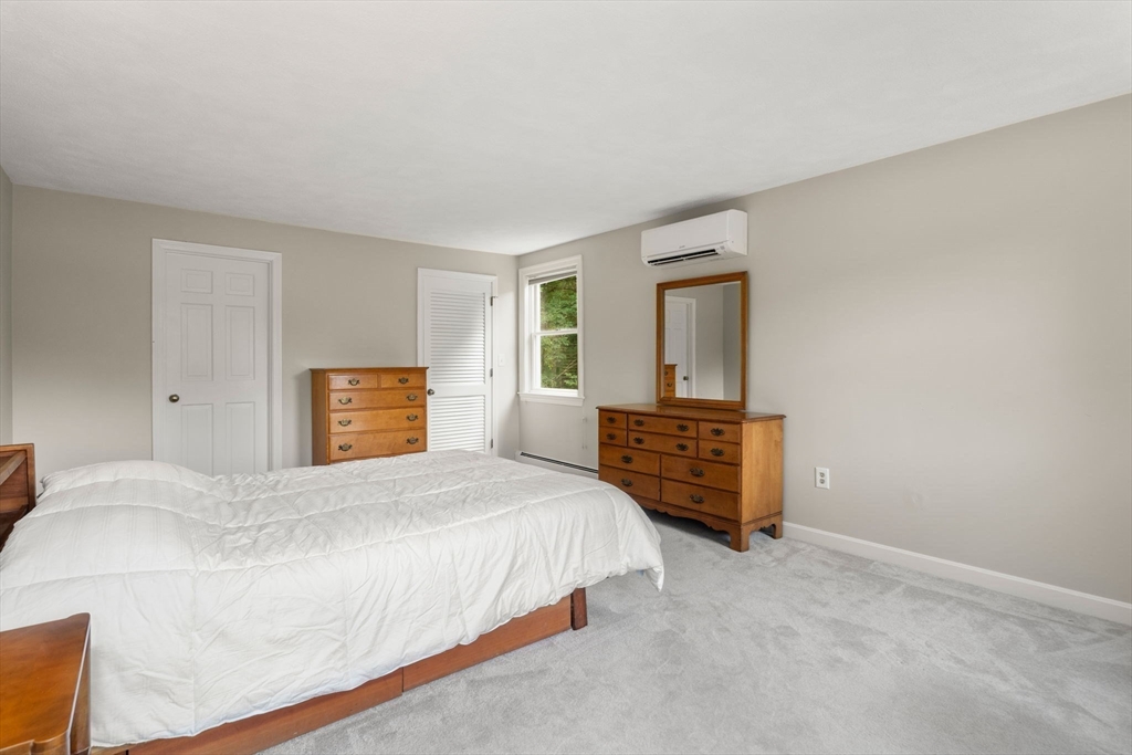 1 Pueblo Road Medfield, MA 02052 - Photo 21 of 36 a bedroom with a bed and dresser