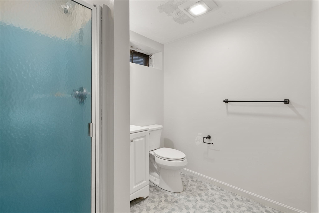 1 Pueblo Road Medfield, MA 02052 - Photo 29 of 36 a bathroom with a toilet and a shower