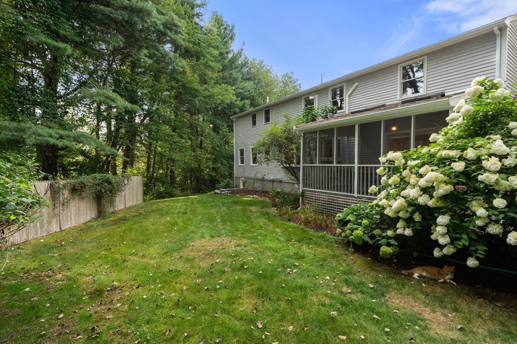 1 Pueblo Road Medfield, MA 02052 - Photo 34 of 36 a front view of a house with garden