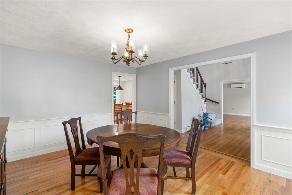 1 Pueblo Road Medfield, MA 02052 - Photo 7 of 36 a view of a dining room with furniture and wooden floor