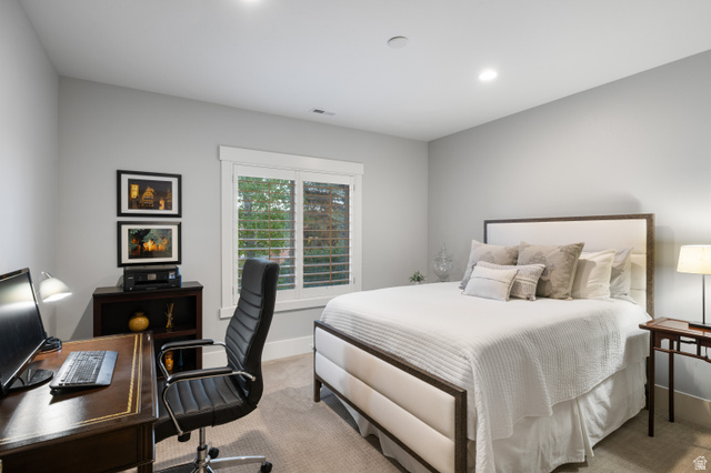 1737 East Viewside Circle Hideout, UT 84036 - Photo 21 of 35 Carpeted room featuring a window with white plantation shutters, recessed lighting, and a neutral wall color