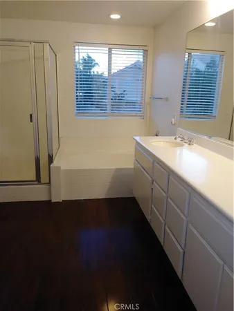 a bathroom with a sink and a bathtub