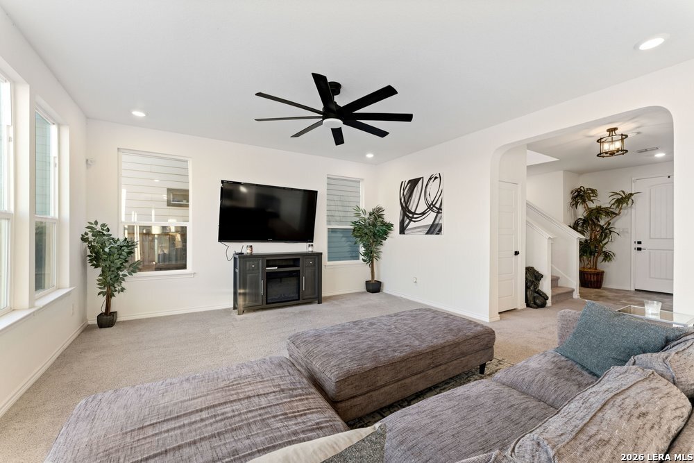 9422 Braman Converse, TX 78109 - Photo 11 of 26 a living room with furniture and a flat screen tv