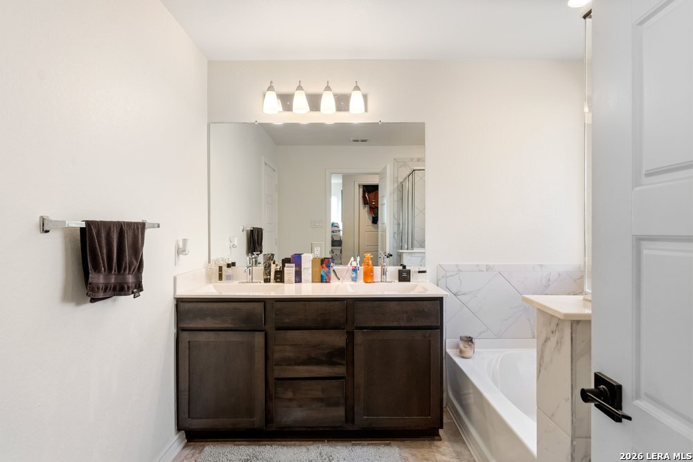 9422 Braman Converse, TX 78109 - Photo 23 of 26 a bathroom with a sink and a mirror