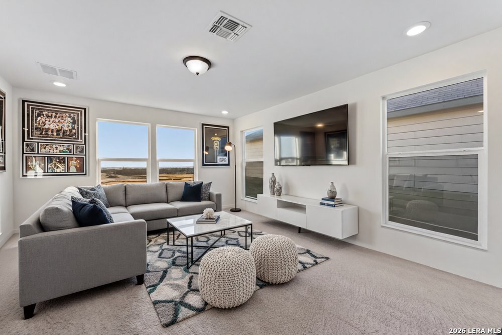 9422 Braman Converse, TX 78109 - Photo 5 of 26 a living room with furniture and a flat screen tv