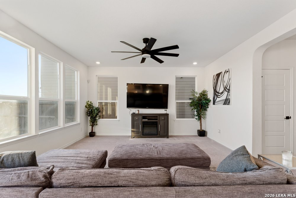 9422 Braman Converse, TX 78109 - Photo 9 of 26 a living room with furniture and a flat screen tv