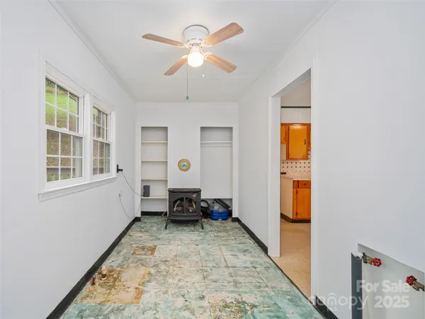 a view of livingroom with furniture and windows