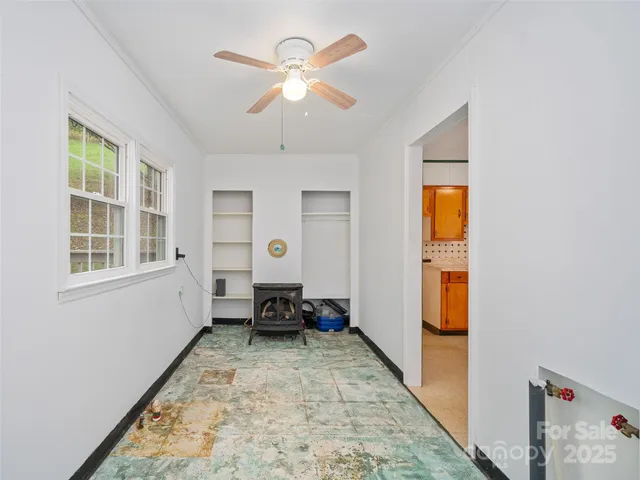 a view of livingroom with furniture and windows