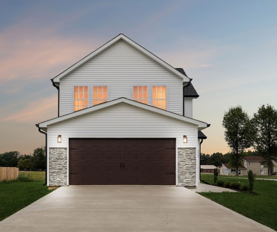 front view of a house with a yard