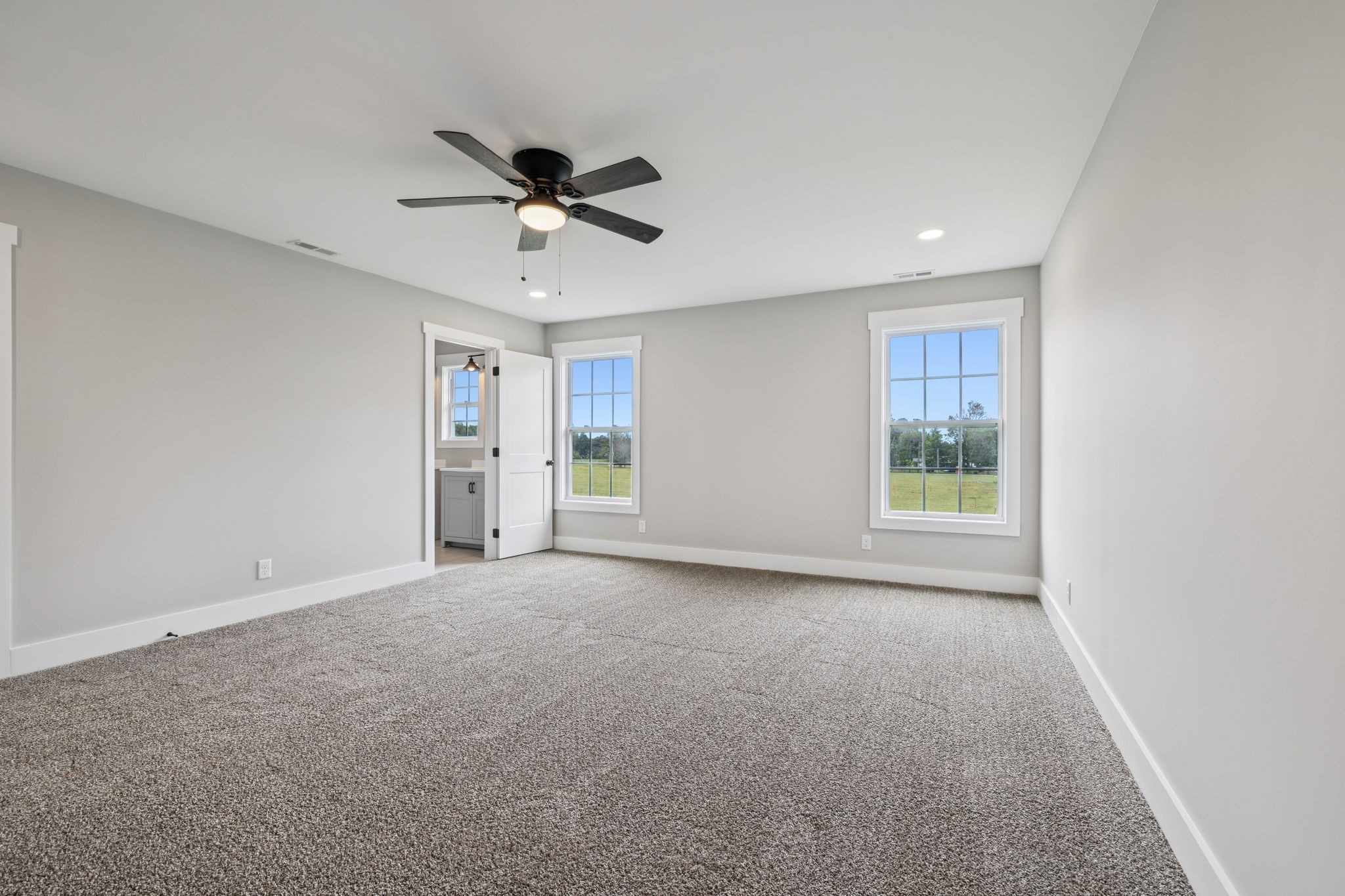 700 Robinson Road Smithville, TN 37166 - Photo 22 of 36 a view of a livingroom with a ceiling fan and window