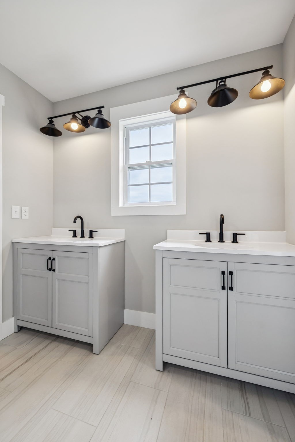 700 Robinson Road Smithville, TN 37166 - Photo 26 of 36 a bathroom with a double vanity sink a mirror and a shower