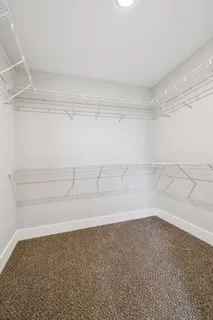 a view of a room with racks on the wall