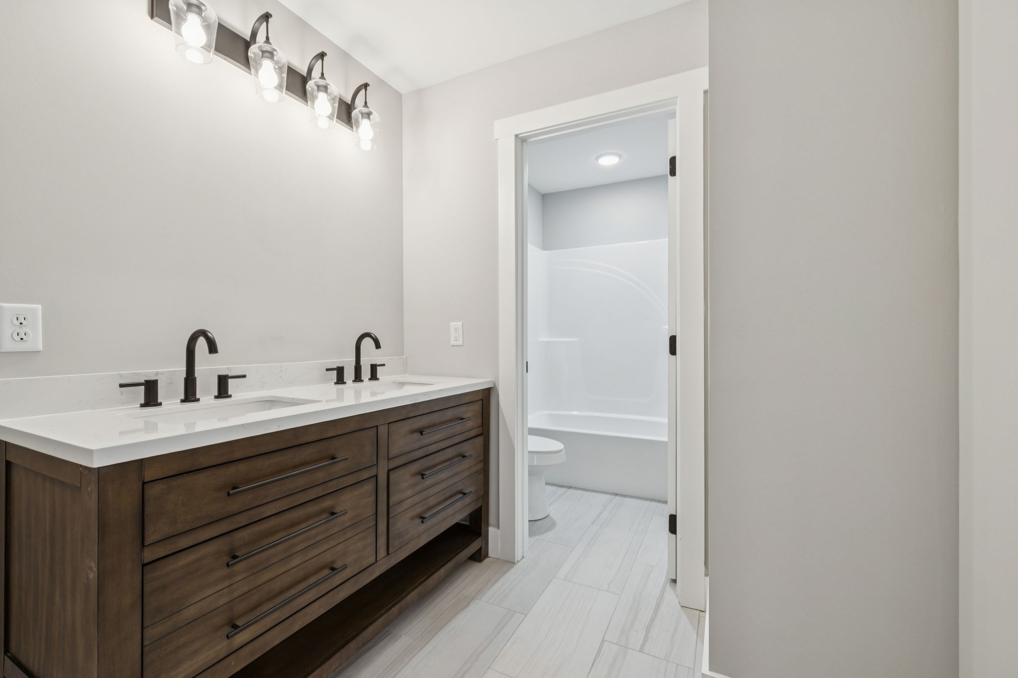 700 Robinson Road Smithville, TN 37166 - Photo 30 of 36 a bathroom with a sink a mirror and shower