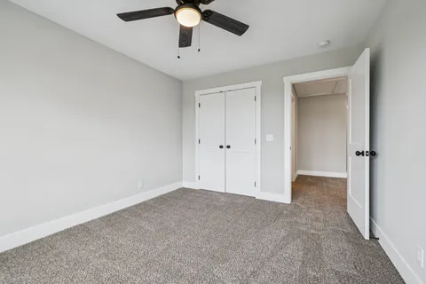 an empty room with fan