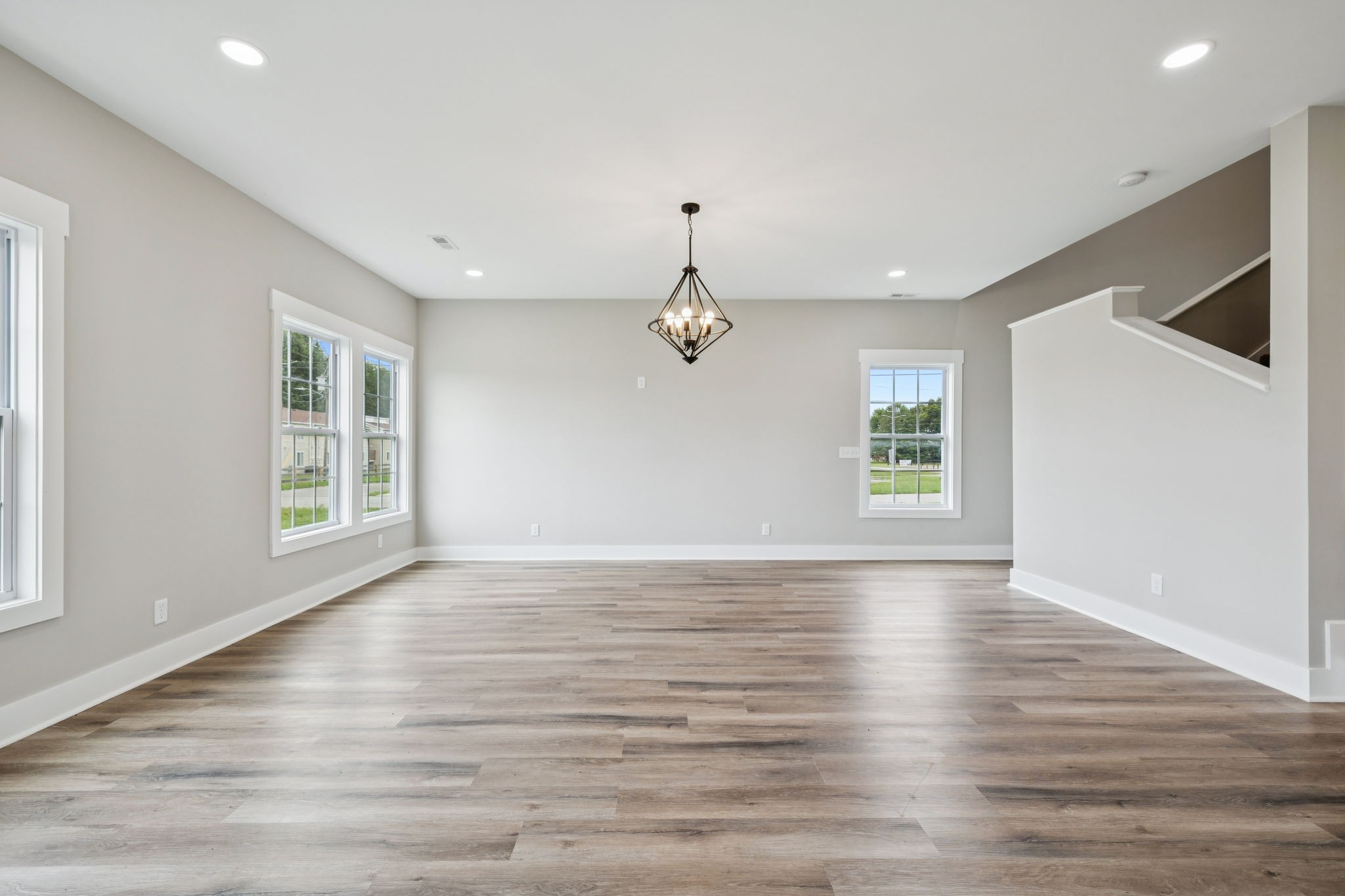 700 Robinson Road Smithville, TN 37166 - Photo 10 of 36 a view of an empty room with wooden floor and a window