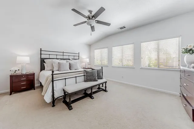 a bathroom with a shower and a sink