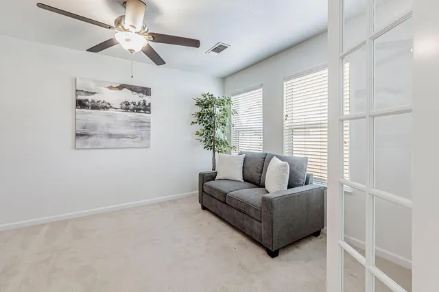 a bathroom with a double vanity sink and mirror