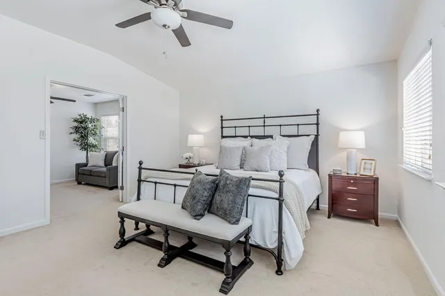 a bedroom with furniture and a bed