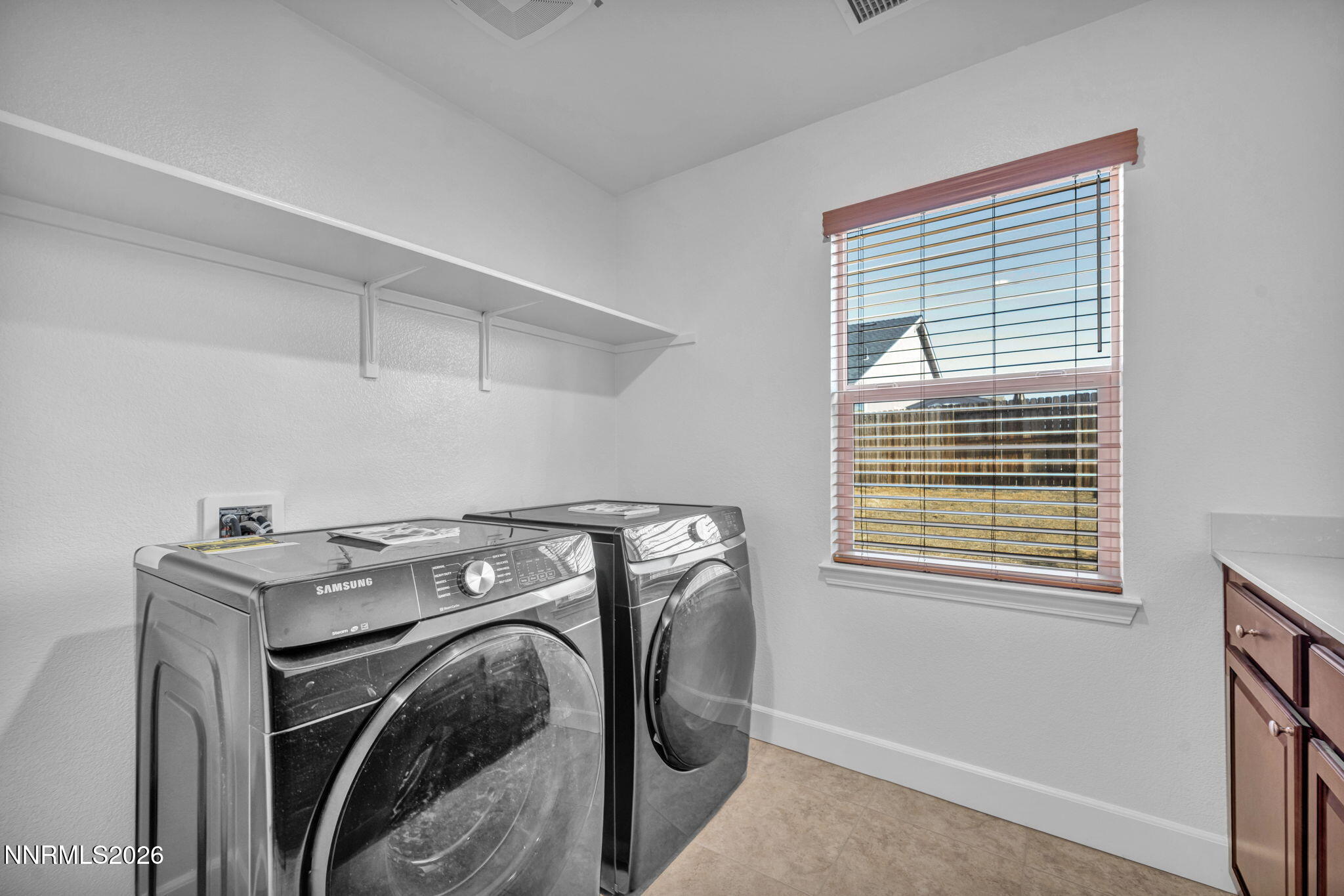 7181 Saddlehorn Road Carson City, NV 89701 - Photo 44 of 62 a utility room with dryer and washer