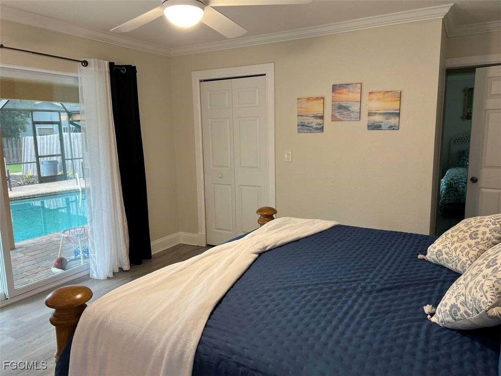 5730 Winkler Road Fort Myers, FL 33919 - Photo 18 of 37 a bedroom with a bed and a window