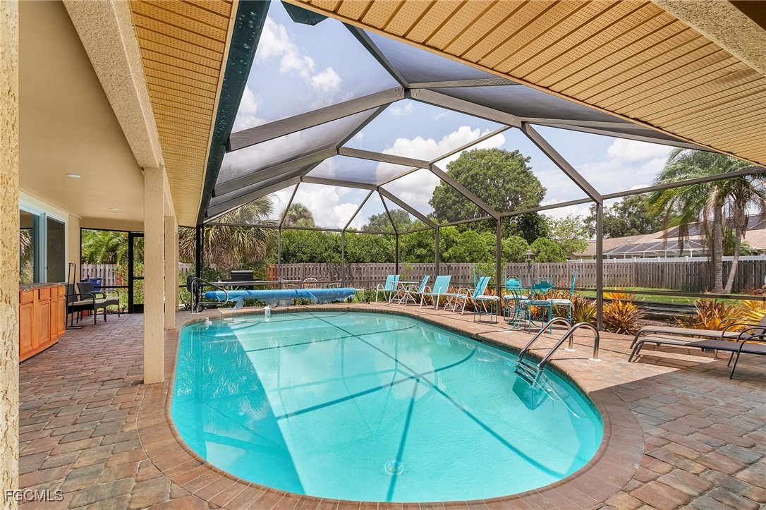 5730 Winkler Road Fort Myers, FL 33919 - Photo 24 of 37 a view of a swimming pool with sitting area