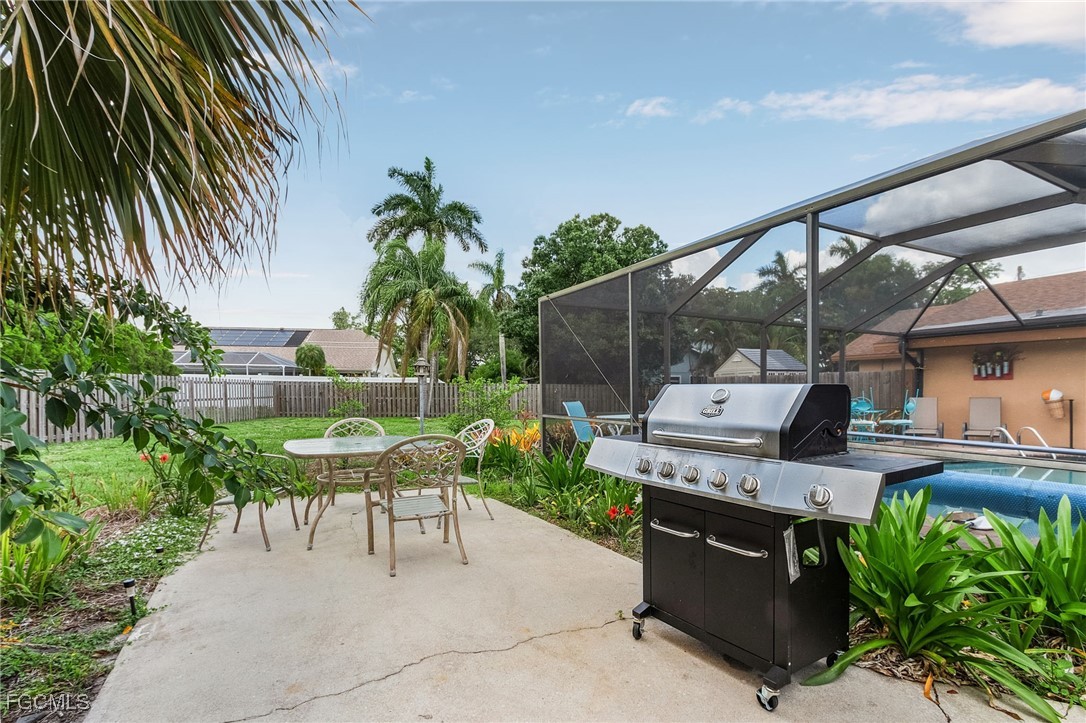 5730 Winkler Road Fort Myers, FL 33919 - Photo 32 of 37 a view of backyard with seating space