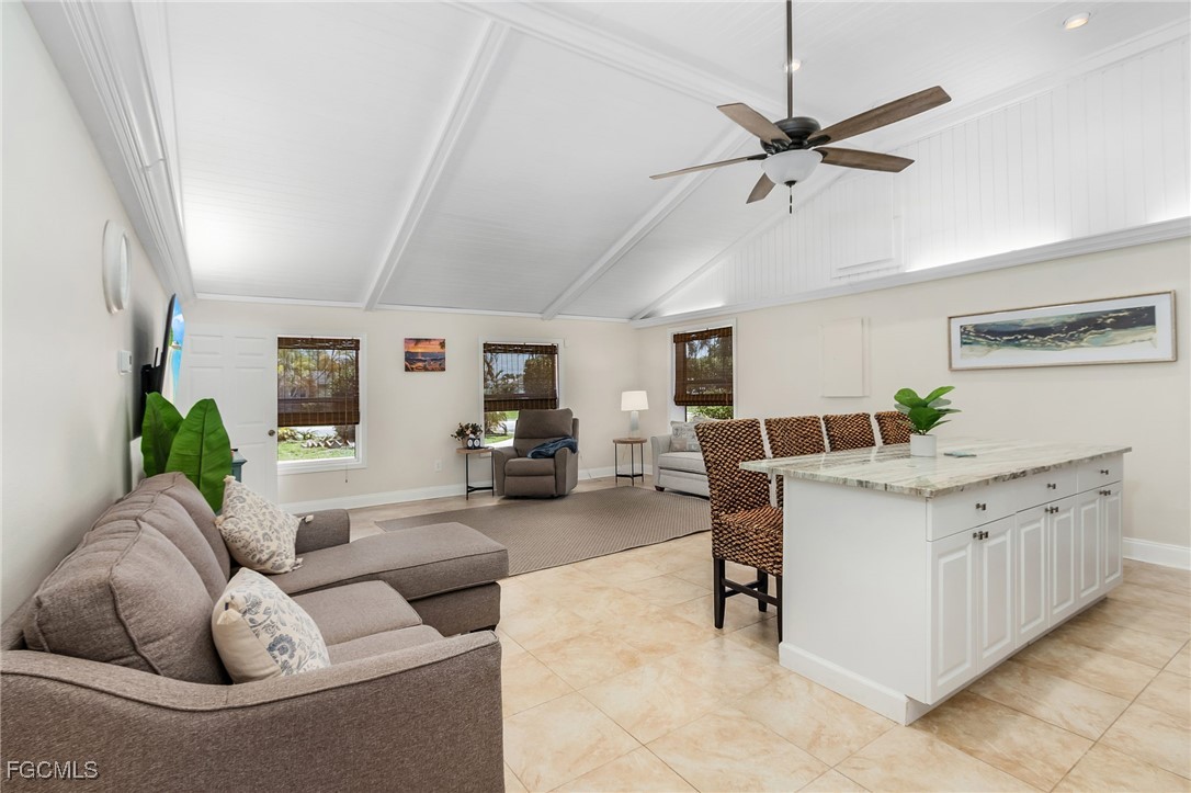 5730 Winkler Road Fort Myers, FL 33919 - Photo 9 of 37 a living room with furniture and white walls