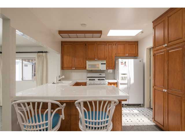 10444 Timberlane Way Santee, CA 92071 - Photo 2 of 12 UPDATED KITCHEN WITH BREAKFAST BAR - SKYLIGHTS BRING IN ABUNDANT NATURAL LIGHT