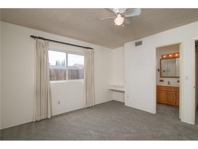 10444 Timberlane Way Santee, CA 92071 - Photo 8 of 12 MASTER BEDROOM WITH BUILT-IN DESK & IN SUITE BATHROOM