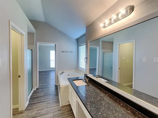 a large hall with lots of wooden floor