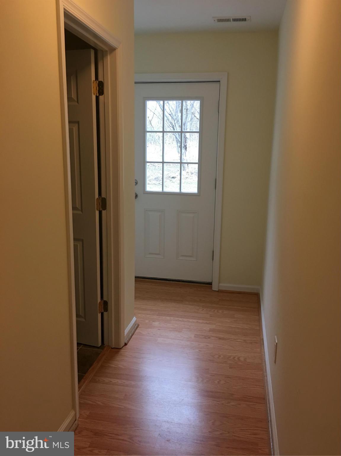6915 Prout Road Friendship, MD 20758 - Photo 17 of 30 Hallway Door to Back Patio