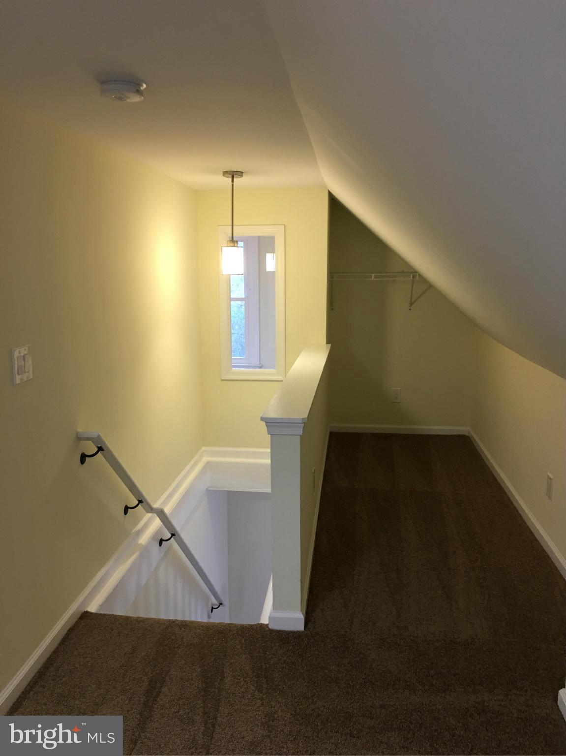 6915 Prout Road Friendship, MD 20758 - Photo 21 of 30 Stairs from Living Room to Third Bedroom