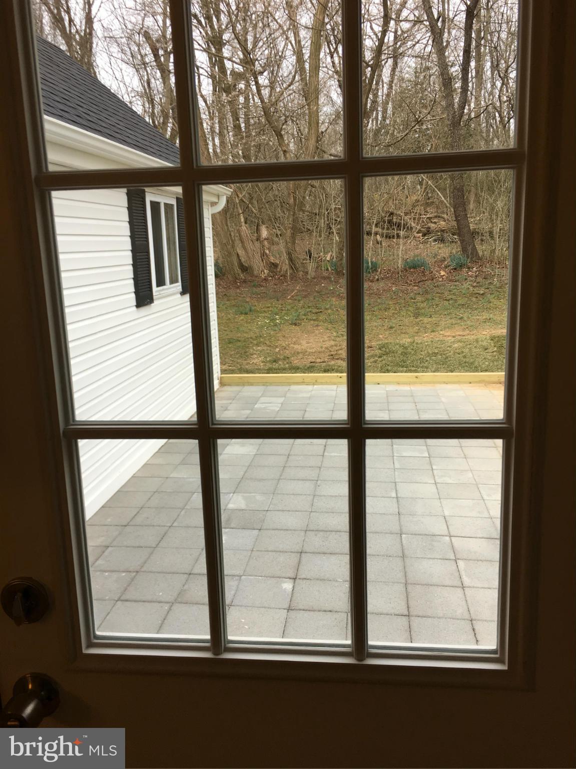 6915 Prout Road Friendship, MD 20758 - Photo 7 of 30 View Out Kitchen Door to Front Patio