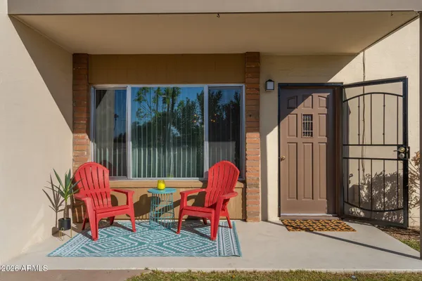 a backyard of a house with seating space