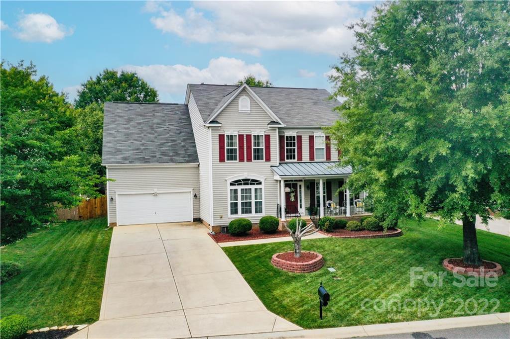 728 Beille Lane Fort Mill, SC 29708 - Photo 1 of 48 a front view of a house with garden